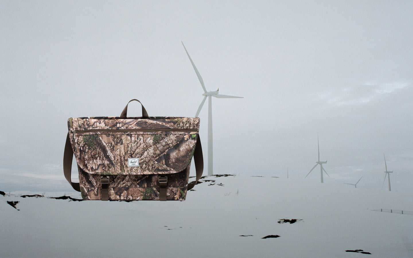 Herschel Supply Co. Realtree Cove Messenger bag in Realtree APX Camo.