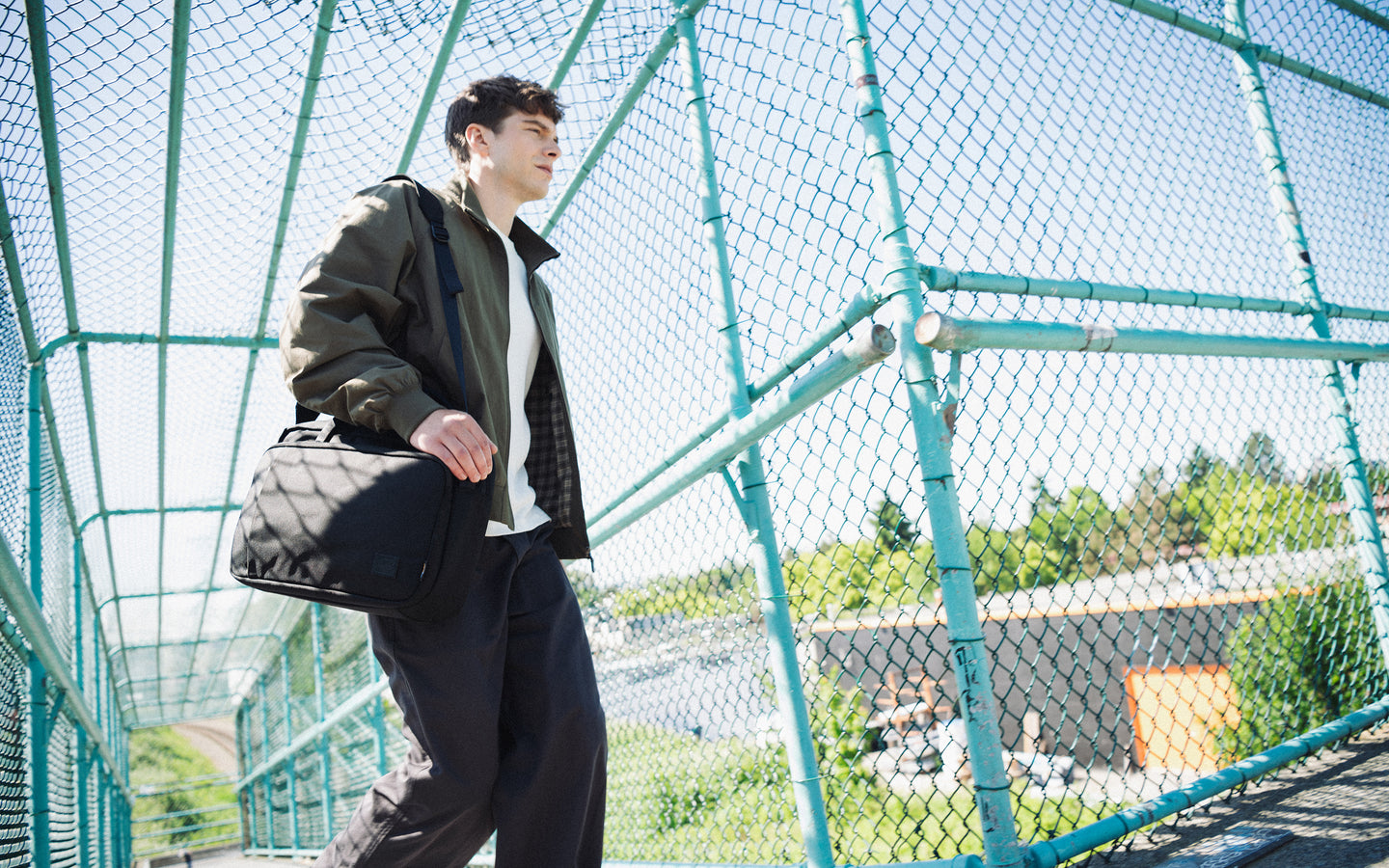 Herschel Supply Co. Gibson Messenger Tech Cordura bag in black, shown from the front on a plain background.