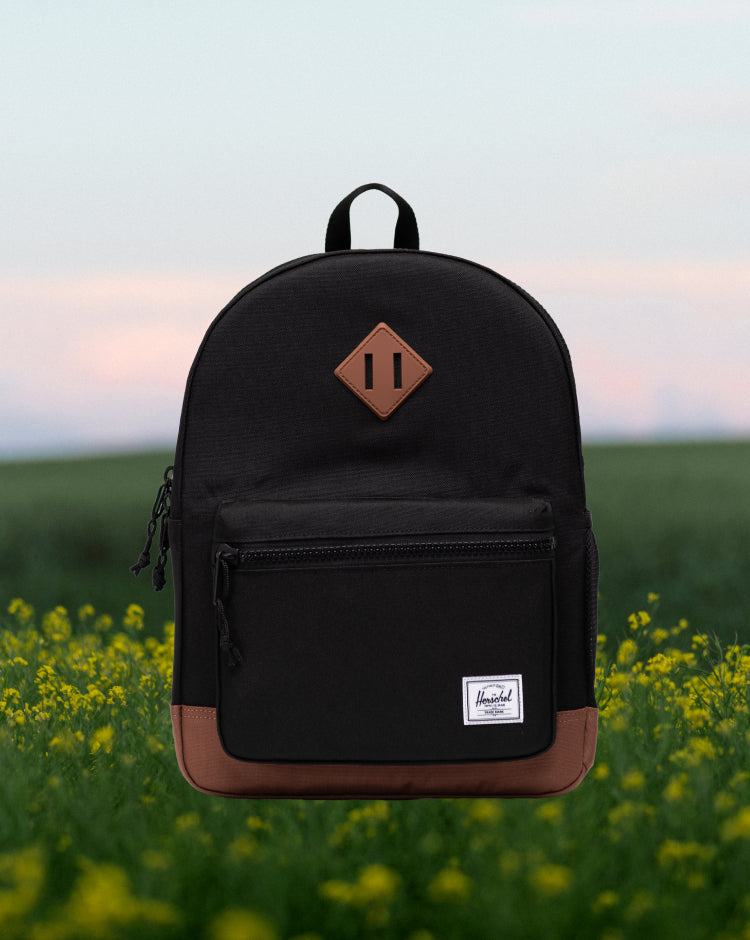 Herschel Heritage Kids Backpack in Black/Saddle Brown.