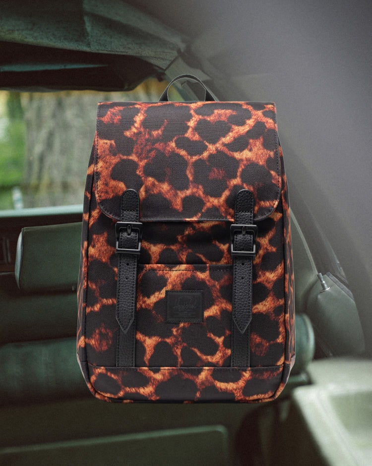 Herschel Retreat Mini Backpack in Digi Leopard pattern.