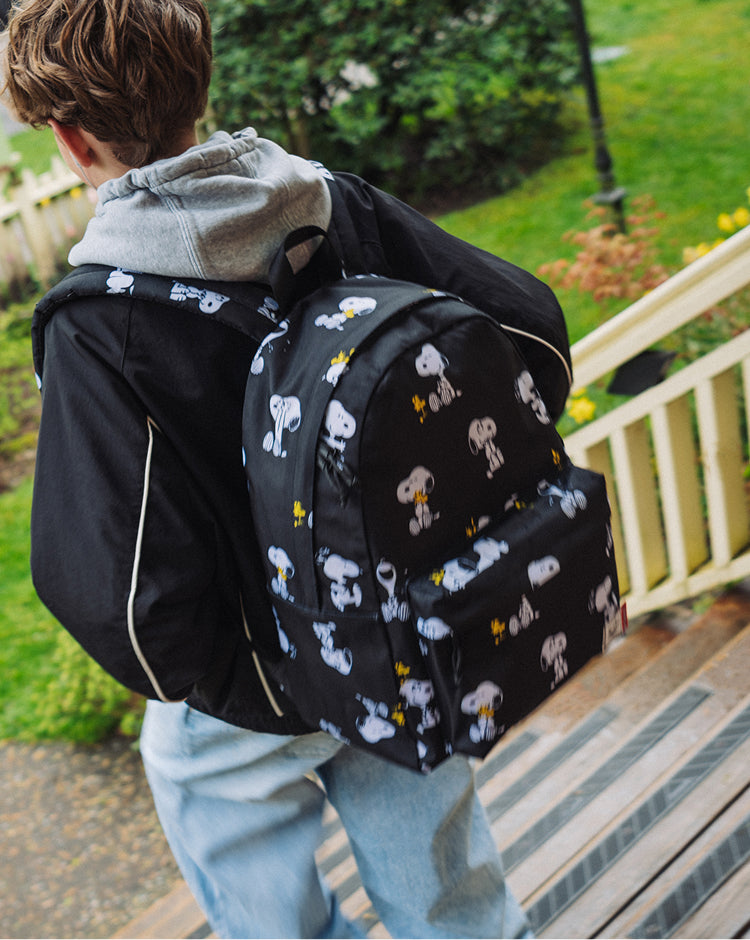 Herschel Supply Co. Peanuts Herschel Classic XL Backpack in Snoopy and Woodstock Black.