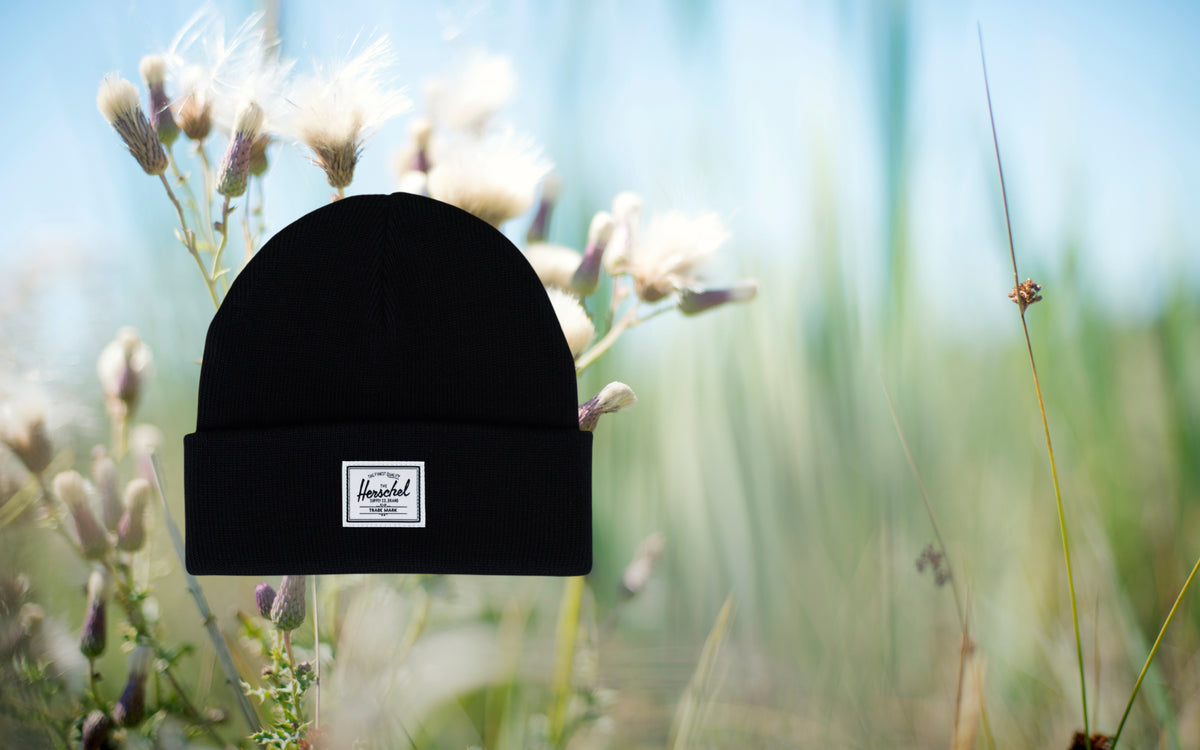 Herschel Supply Co. product featured in a lifestyle hero banner image.