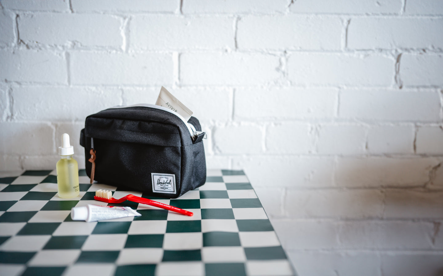 Herschel Supply Co. Chapter Small Travel Kit in black.