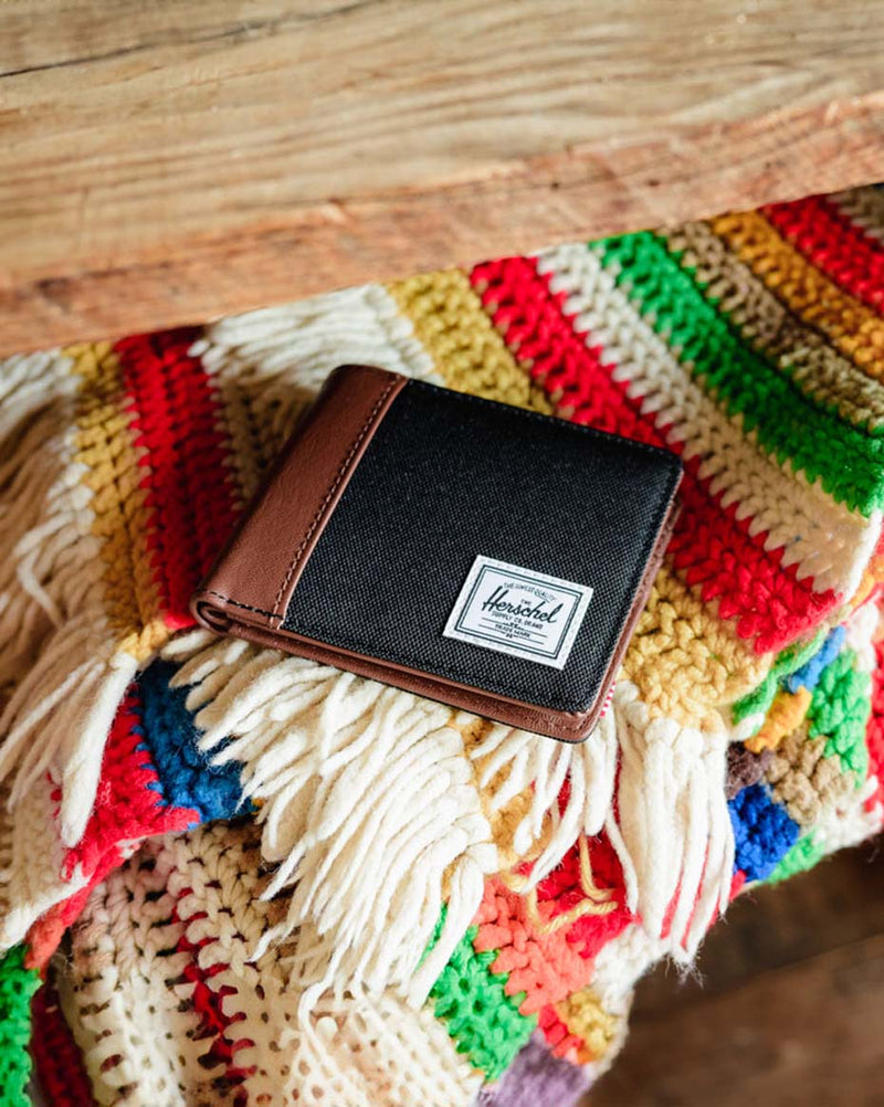 Herschel Supply Co. Hank Wallet in black and tan.