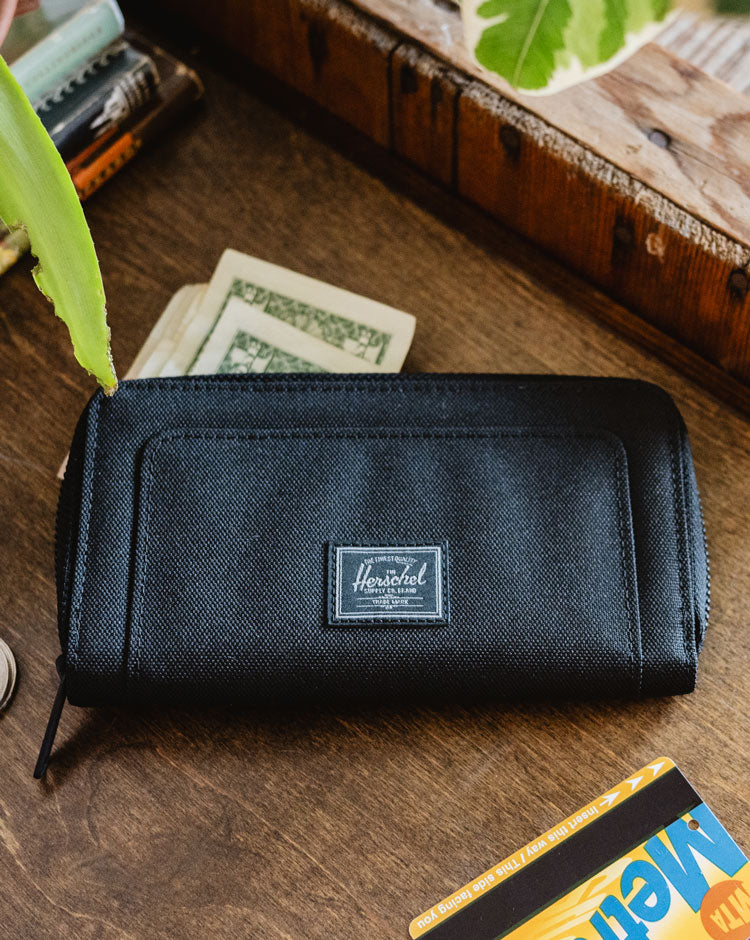 Herschel Supply Co. Thomas Wallet in Black Tonal, sleek zip-around design for sleek everyday organization.