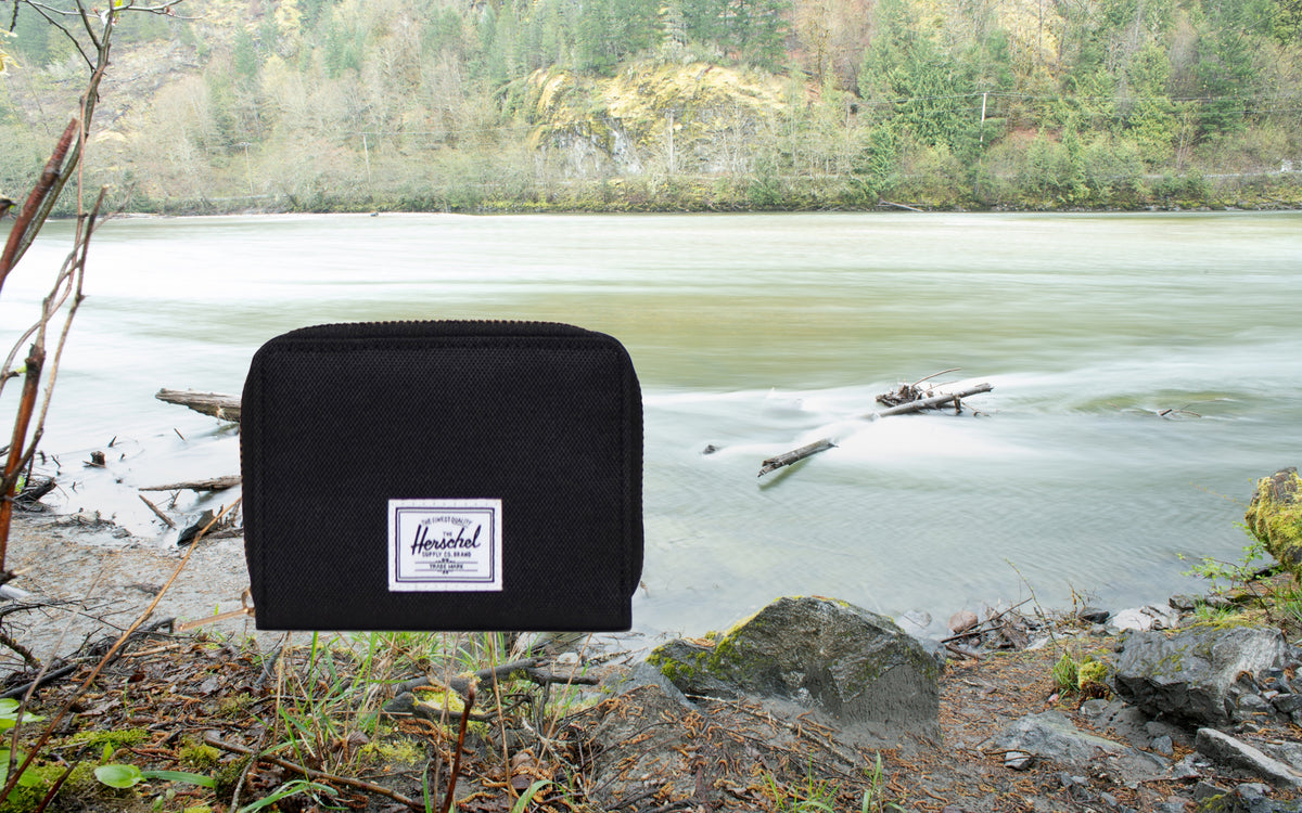 Herschel Supply Co. Tyler Wallet in classic black, showing a sleek, compact design perfect for everyday essentials.