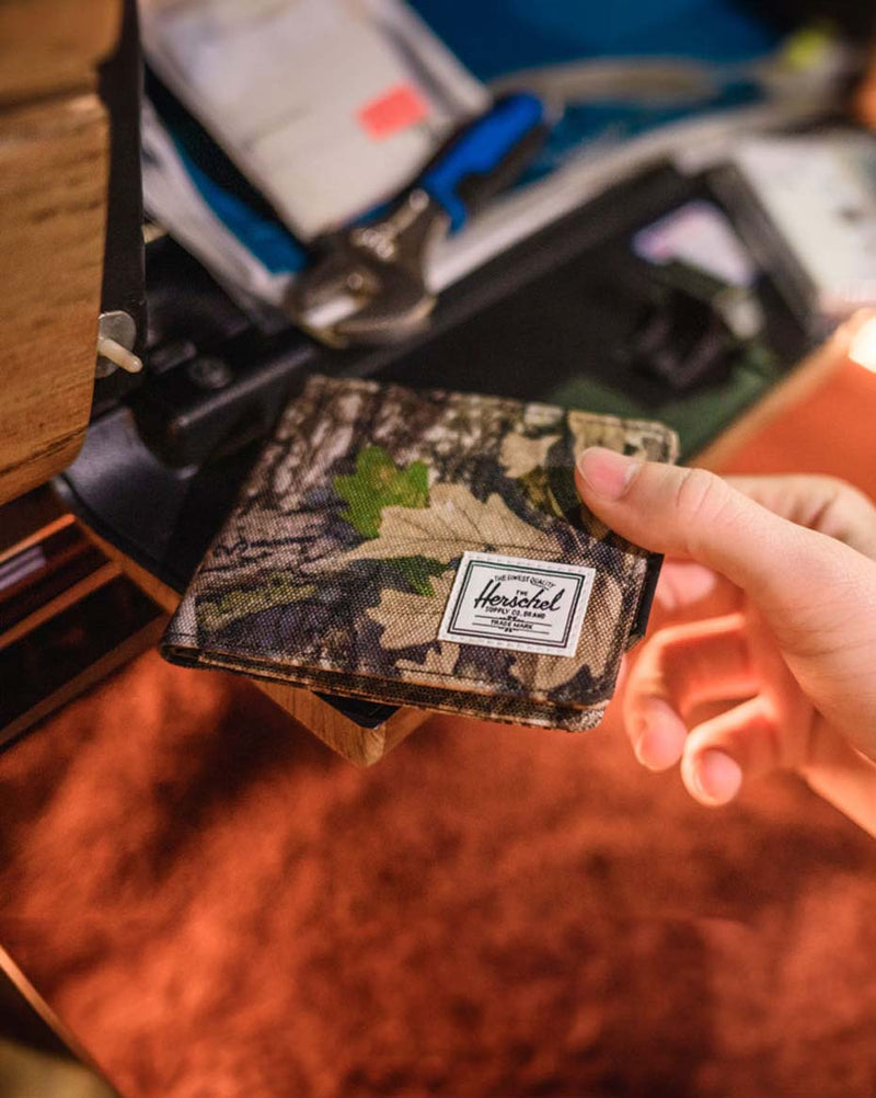Herschel Supply Co. Roy Wallet in Realtree APX Camo pattern.