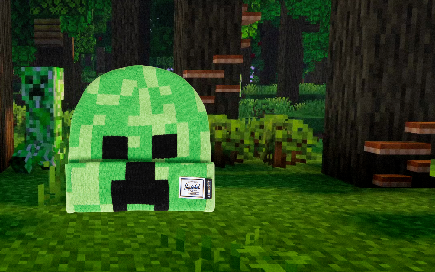 Herschel Supply Co. Minecraft Elmer Beanie in Creeper green color, featuring a classic knit design with a fold-over cuff and pixelated pattern.