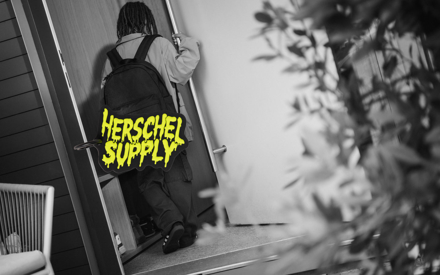 Herschel Supply Co. Slime Bag Charm Little Herschel in black.