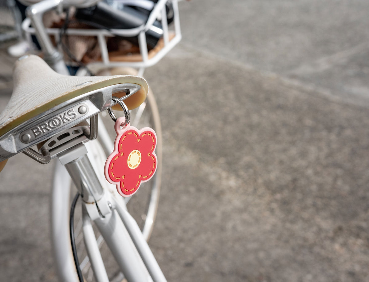 Herschel Supply Co. Herschel Daisy Bag Charm in Pink Daisy.