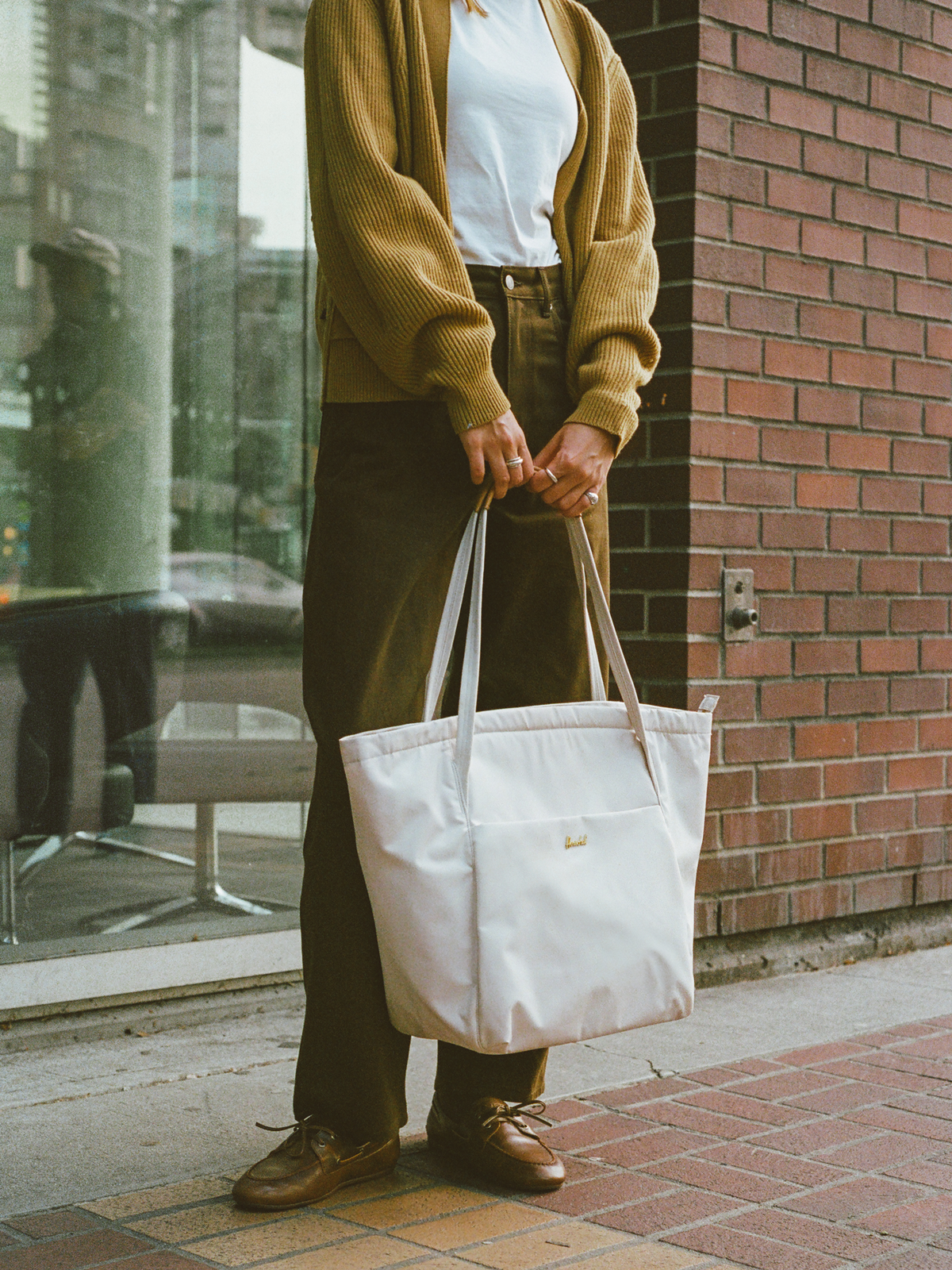 Herschel Supply Co. Mobile Foundation PDP Collection bags and accessories displayed together on a clean backdrop.