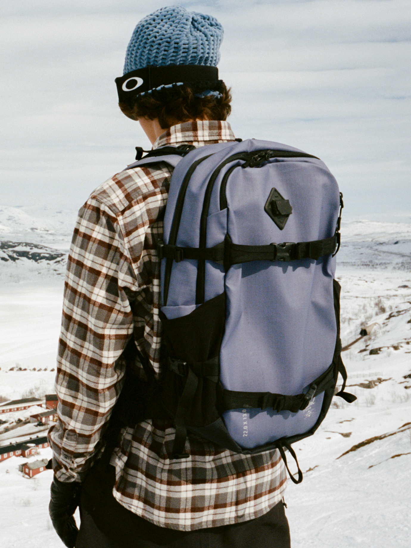 Herschel Supply Co. Outdoor Equipment collection banner showing technical backpacks and duffles in a rugged outdoor setting.
