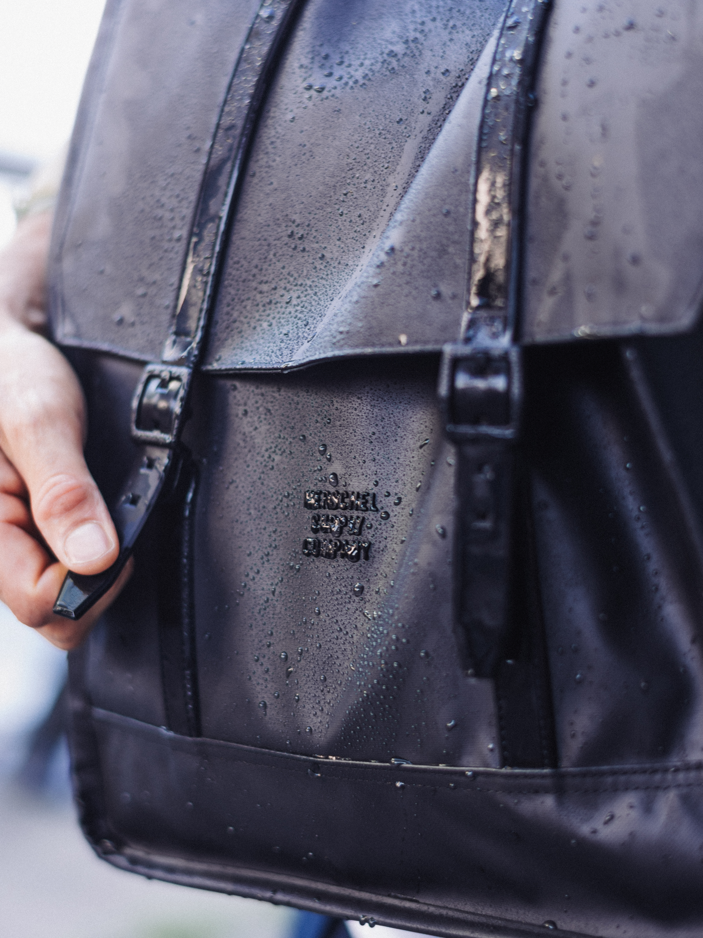 Herschel Supply Co. x Realtree limited-edition collection essential bags, apparel, and accessories arranged together in the APX camouflage pattern.
