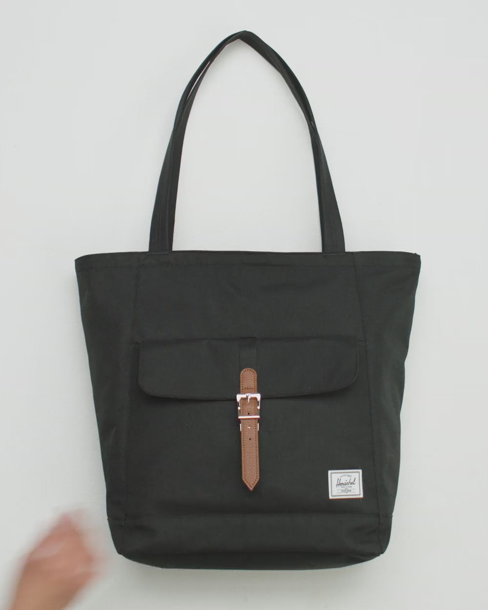 Herschel Supply Co. Retreat Tote shown in a variety of colors and patterns.