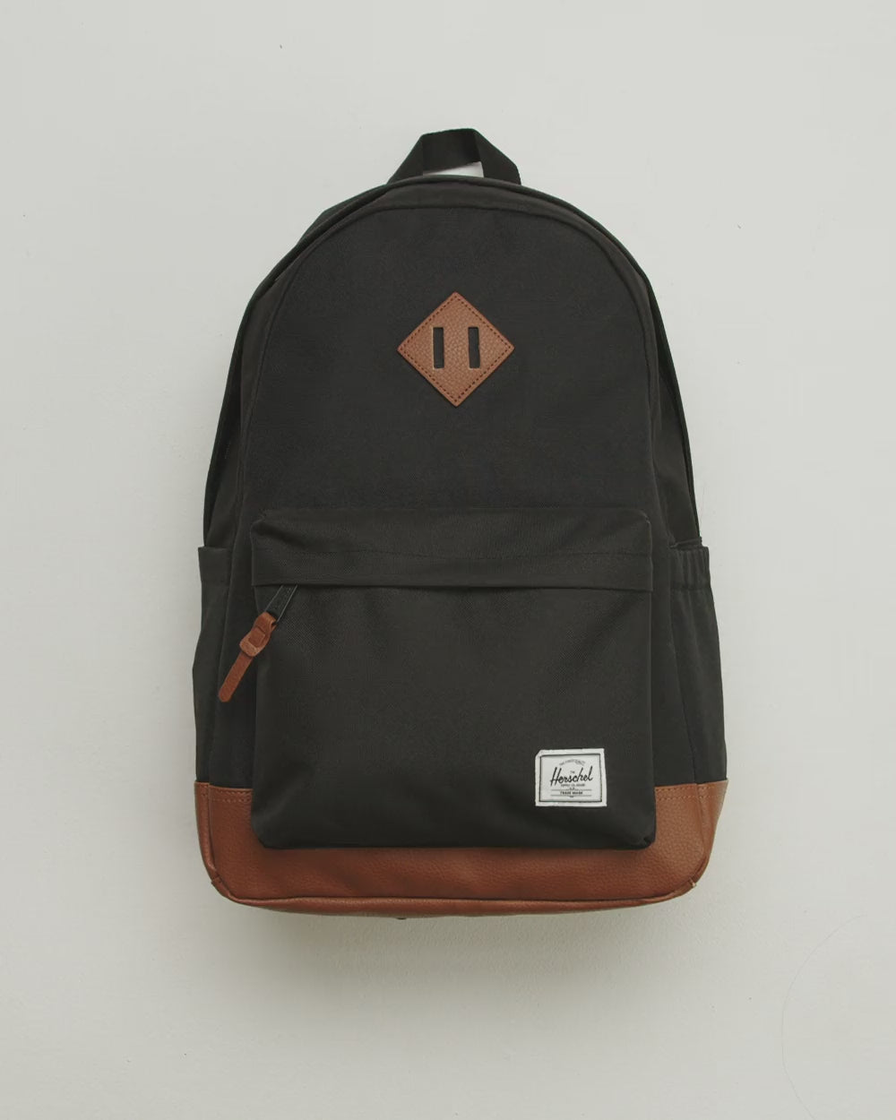 Herschel Heritage Backpack showcasing all available color options to highlight variety.