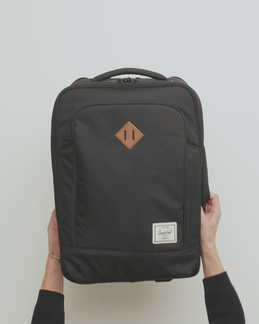 A video showcasing the Herschel Heritage Softshell Large Carry On Luggage collection in a variety of available colors.